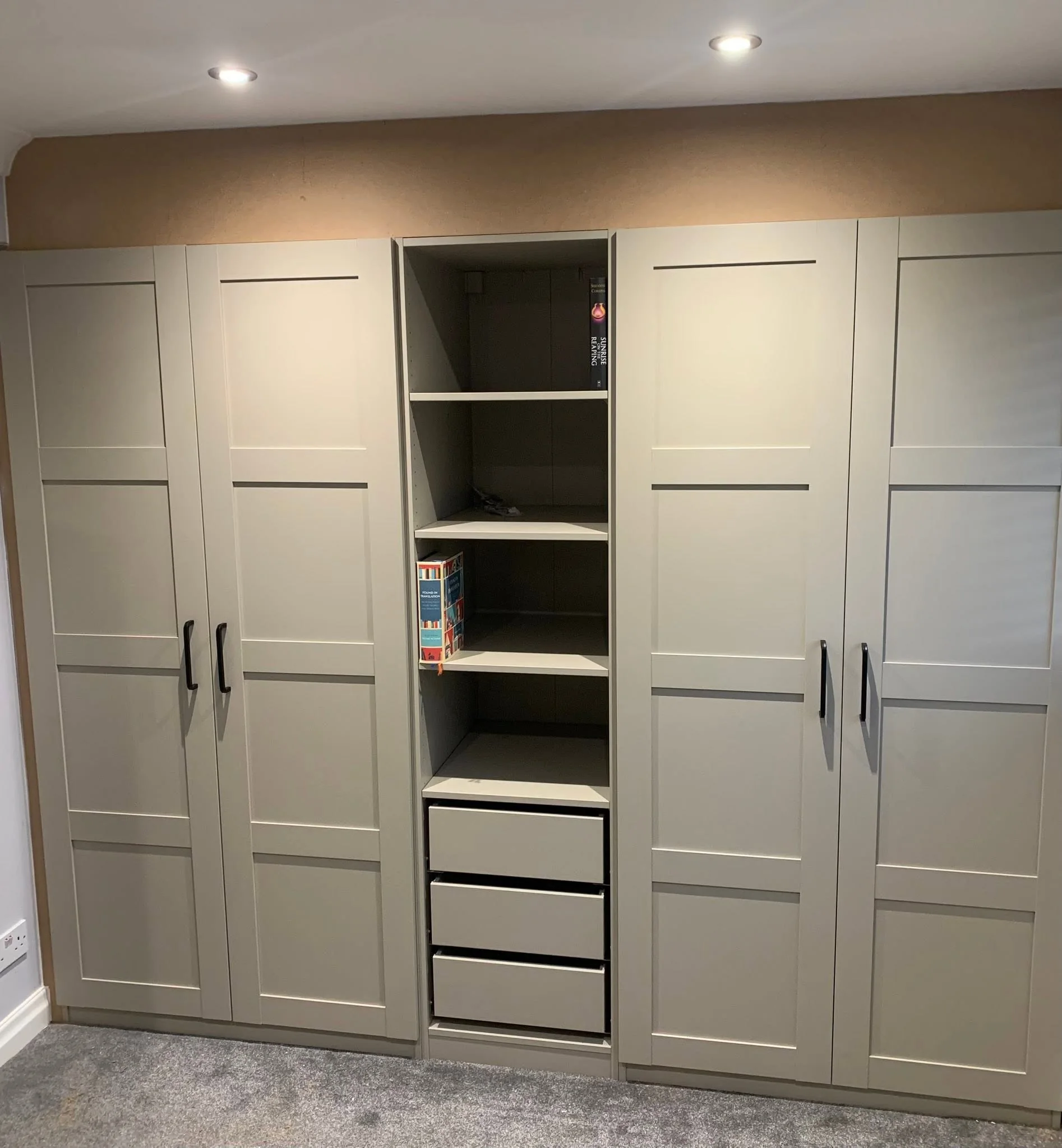 Close view of painted built-in bedroom storage