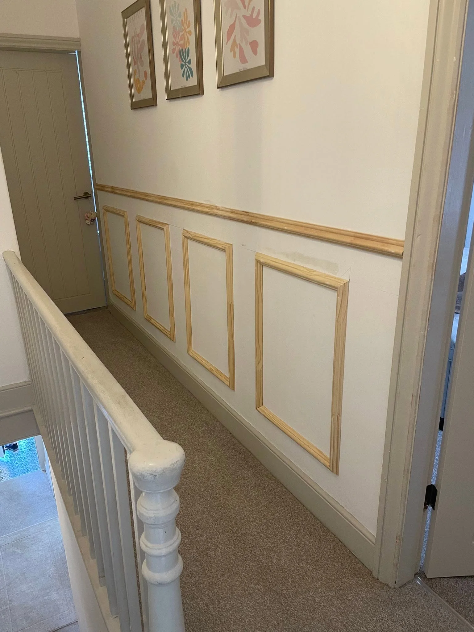 Hallway before decorative wall panelling
