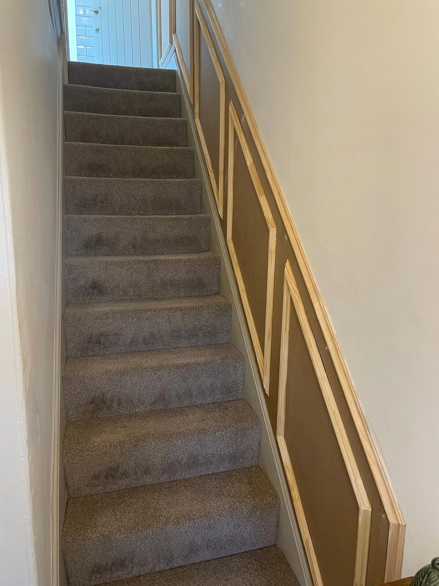 Stair wall before decorative panelling