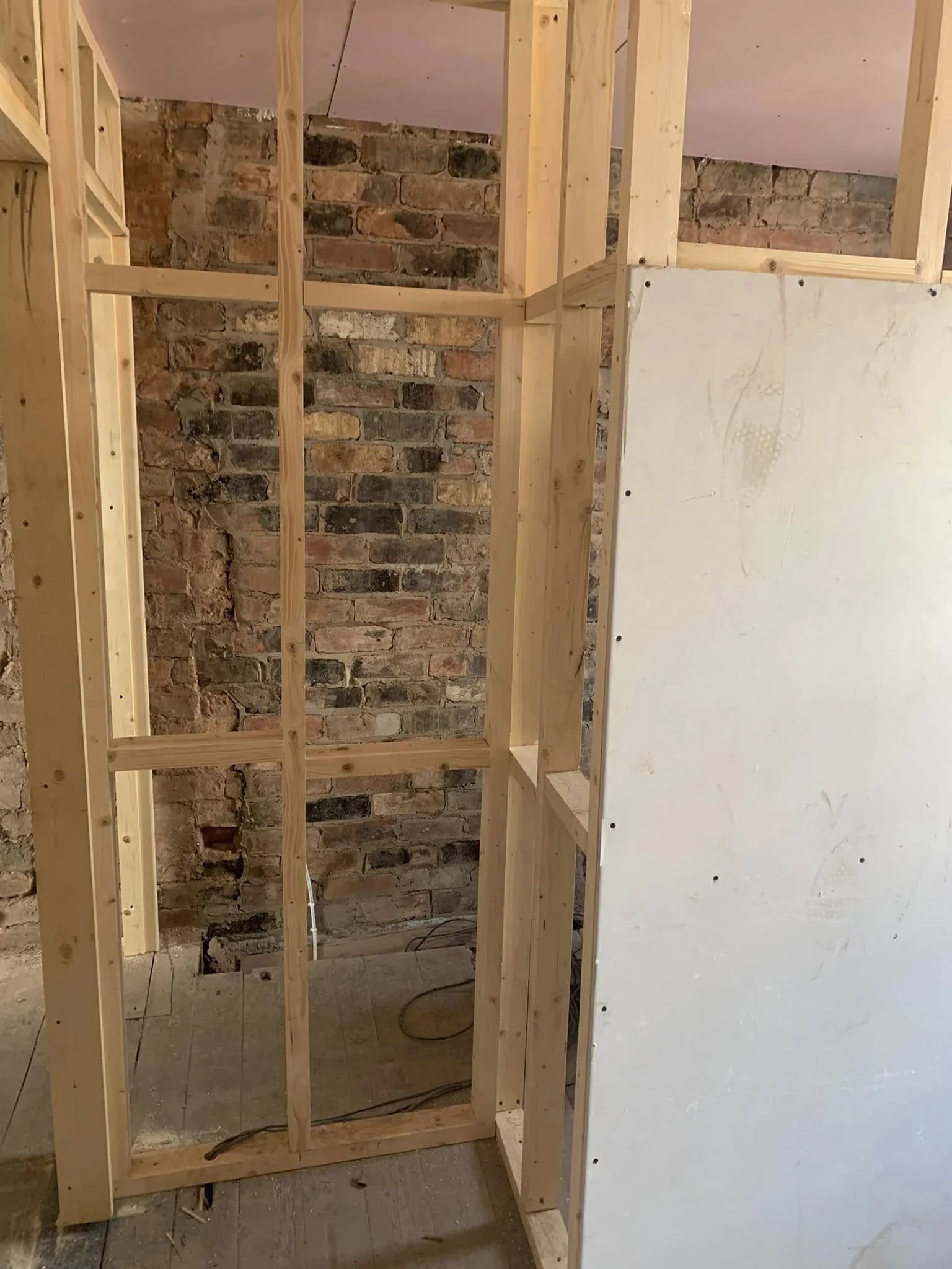 Interior stud wall construction, first stage