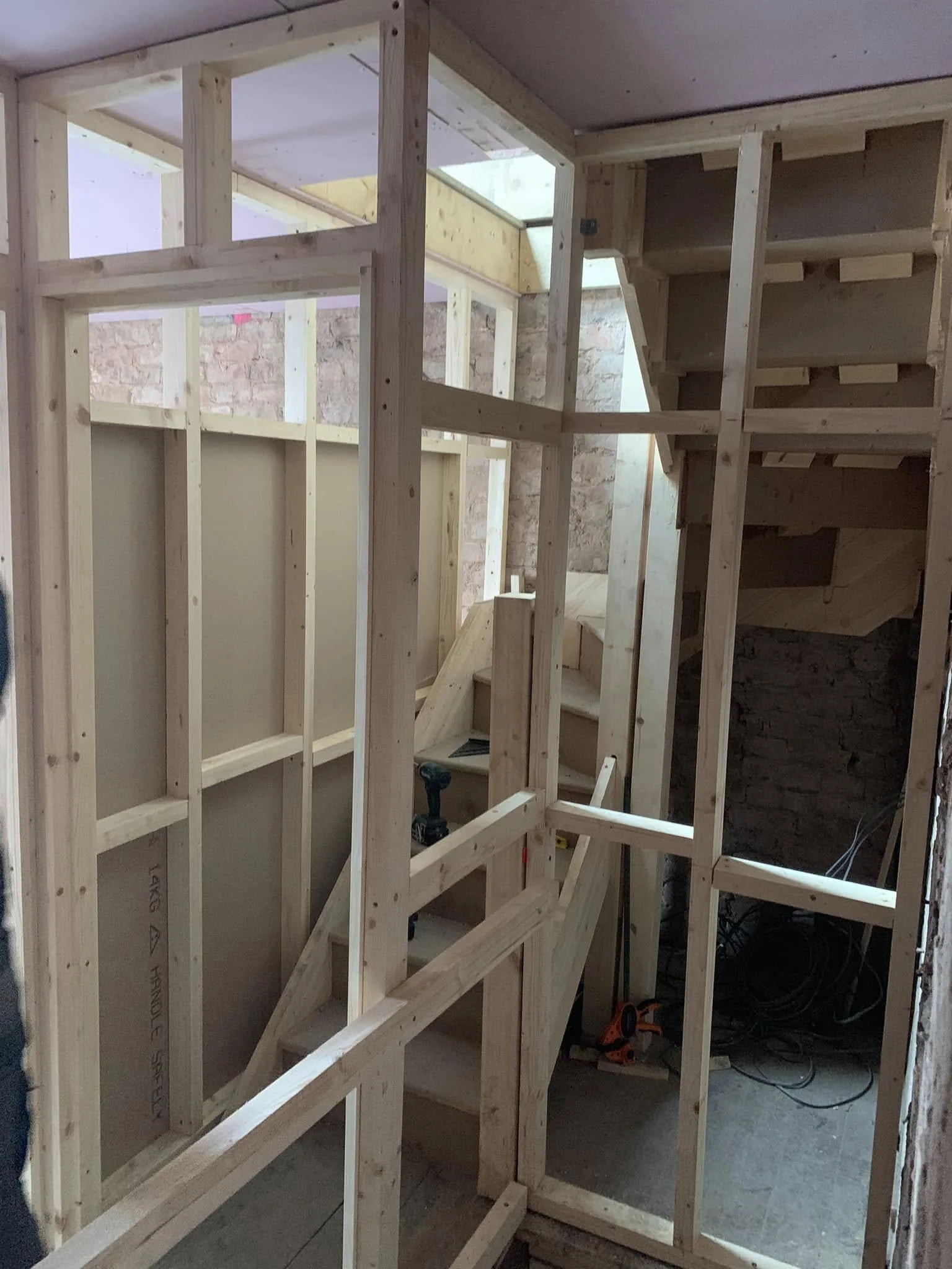 Interior stud wall construction, third stage