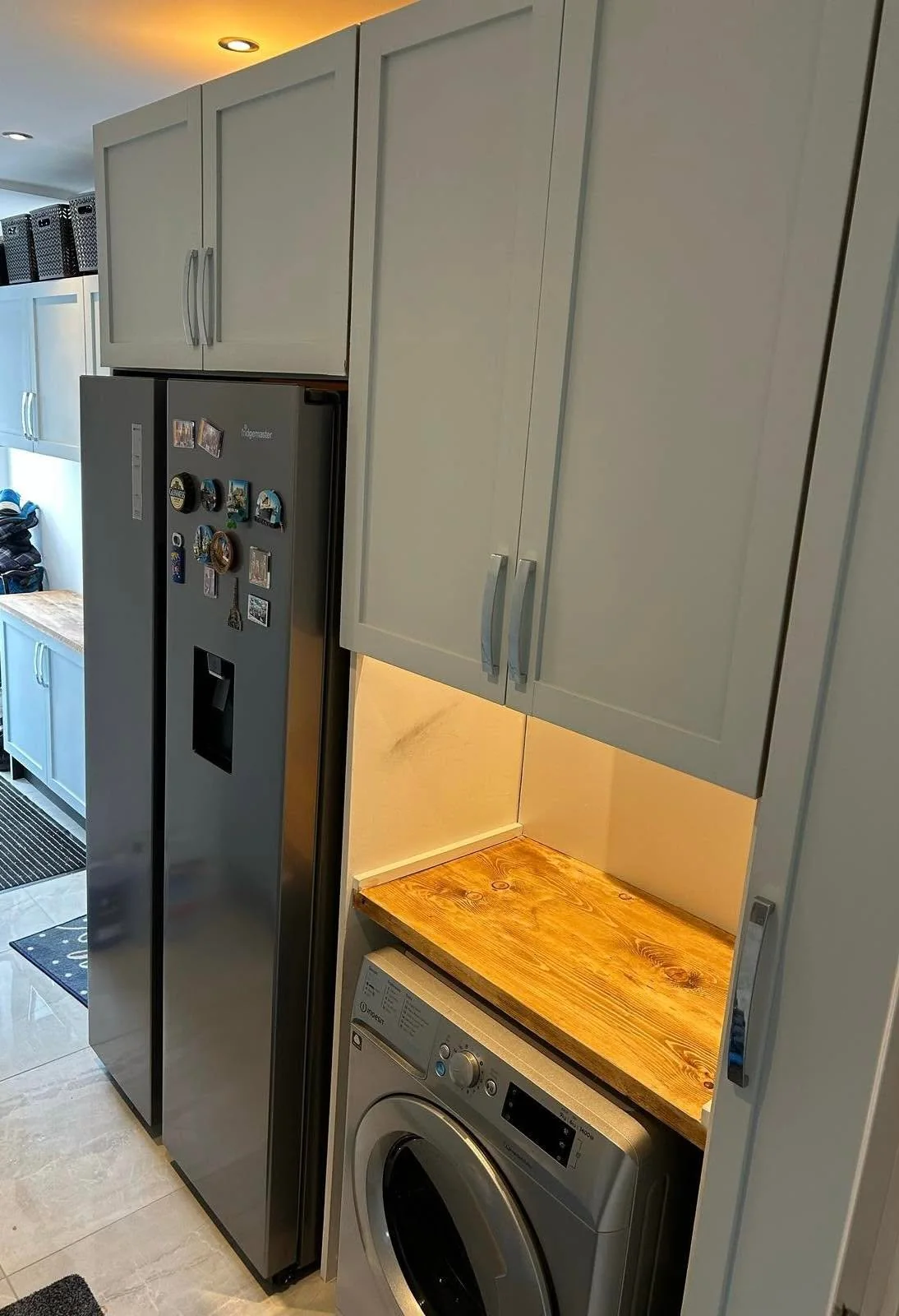 Utility kitchen after its timber work surface was installed