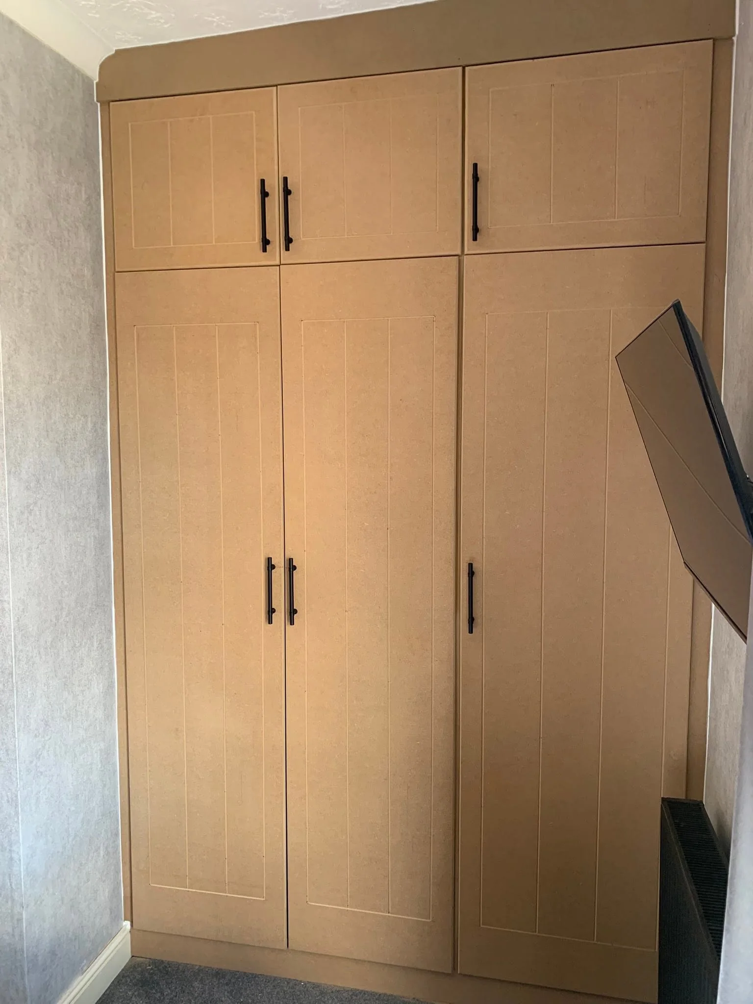 Interior drawers and shelving inside fitted bedroom storage